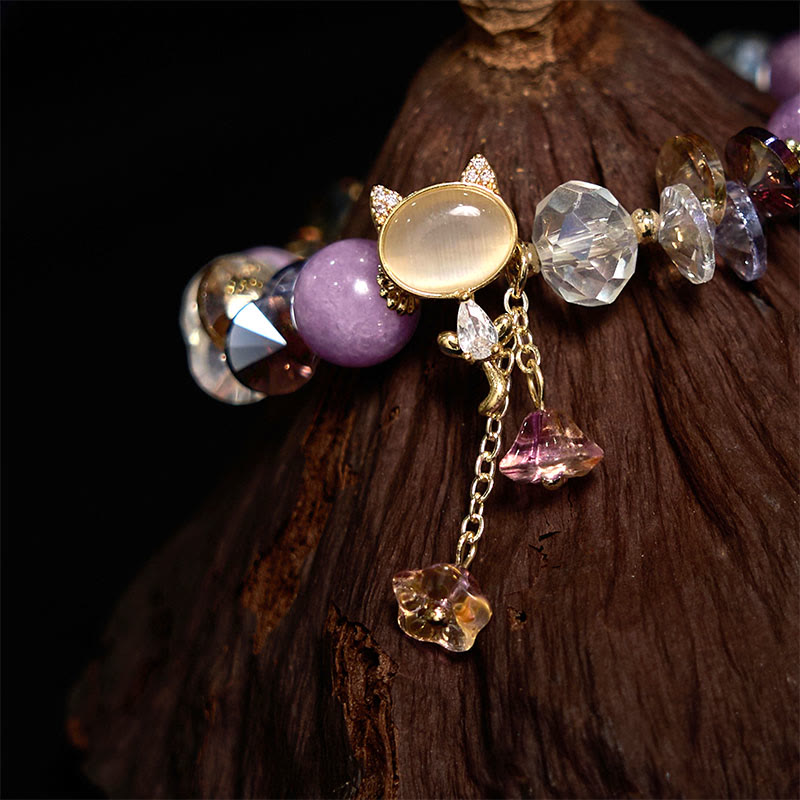 Balance-Armband mit Katzenmotiv und mehreren Kristallen