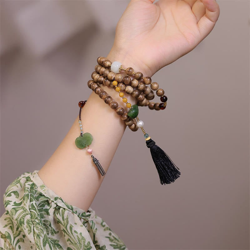 Natürliches Adlerholz-Bernstein-Jade-Armband für Gleichgewicht und Schutz