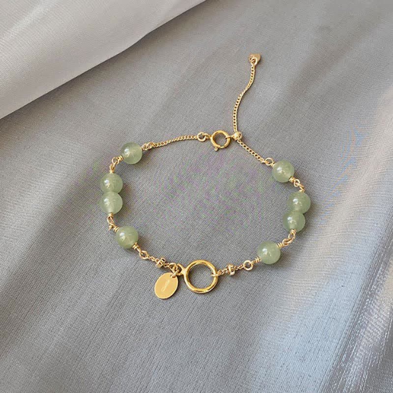 Natürliches Hetian-Jade-Armband aus 14 Karat Gold für Glück und Wohlstand