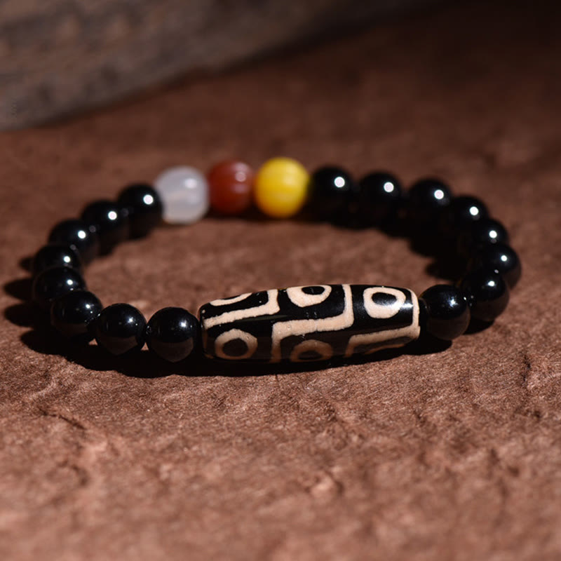 Natürliches Neun-Augen-Dzi-Perlenarmband für spirituellen Reichtum