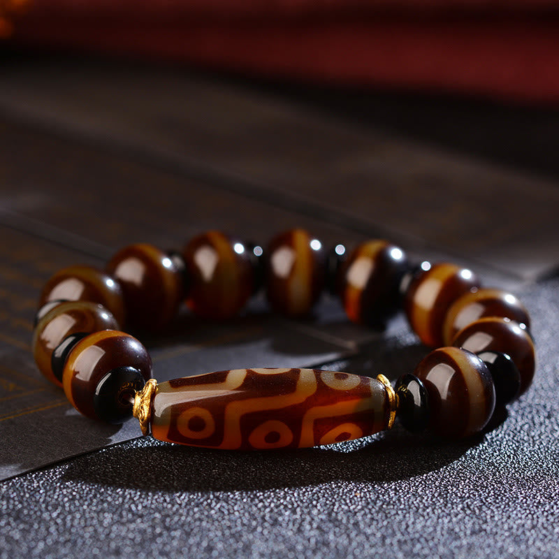 Neun-Augen-Dzi-Perlen-Achat-Armband für Reichtum und Schutz
