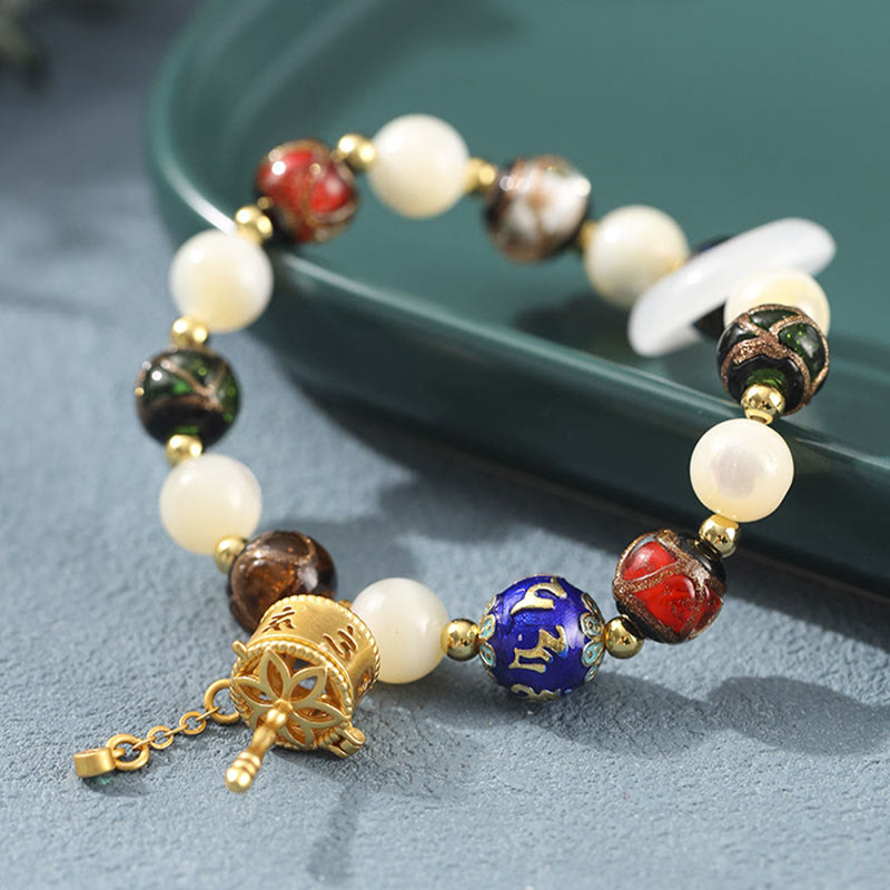 Om Mani Padme Hum Om Armband mit Tridacna & Sonnensteinen 14–16 cm
