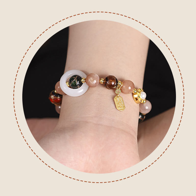 Om Mani Padme Hum Om Armband mit Tridacna & Sonnensteinen 14–16 cm