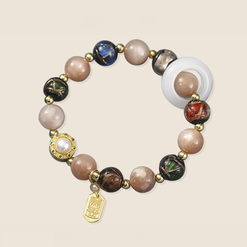 Om Mani Padme Hum Om Armband mit Tridacna & Sonnensteinen 14–16 cm