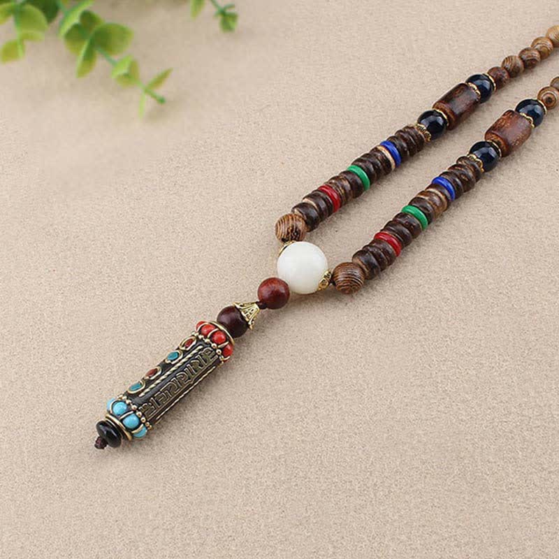 Om Mani Padme Hum Halskette | Wenge Holz Dzi Perlen Anhänger