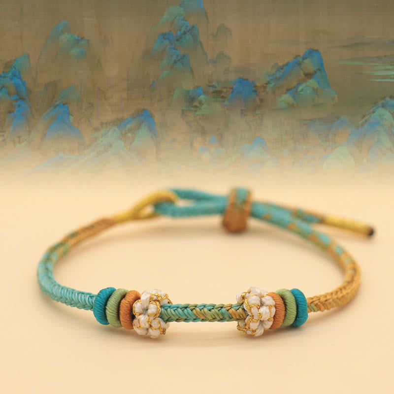 Friedensknoten-Armband mit acht roten Fäden für Glück und Harmonie