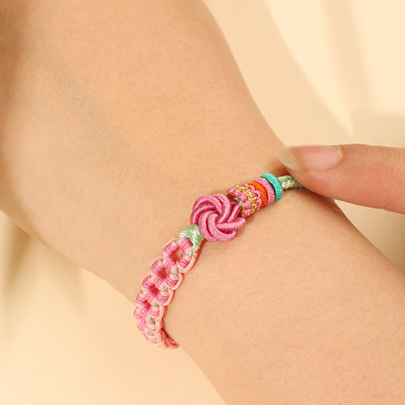 Pfirsichblütenknoten-Armband mit roter Schnur für Schutz und Liebe