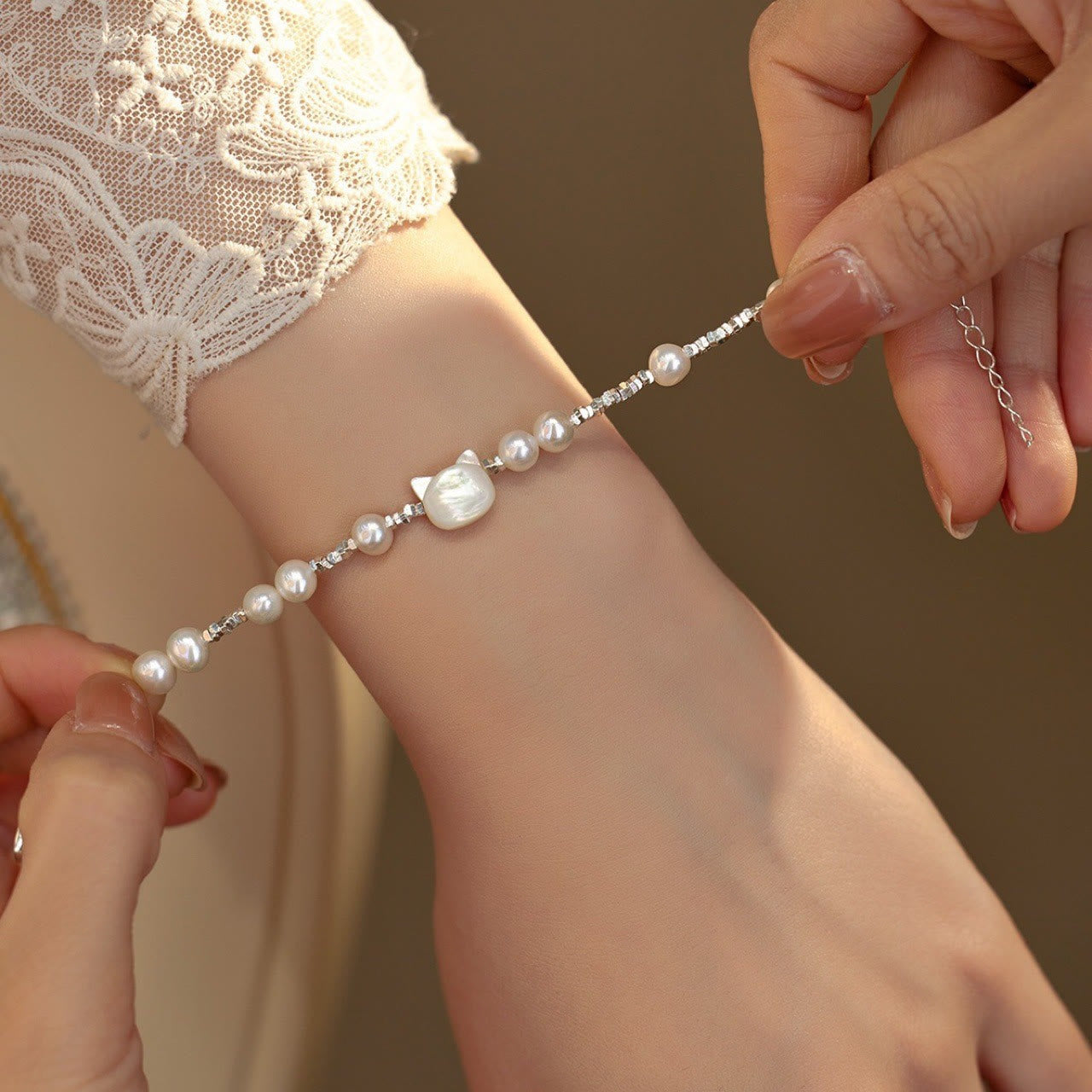 Perlen-Katzenkopf-Heilarmband mit Tridacna-Stein und Silberkette