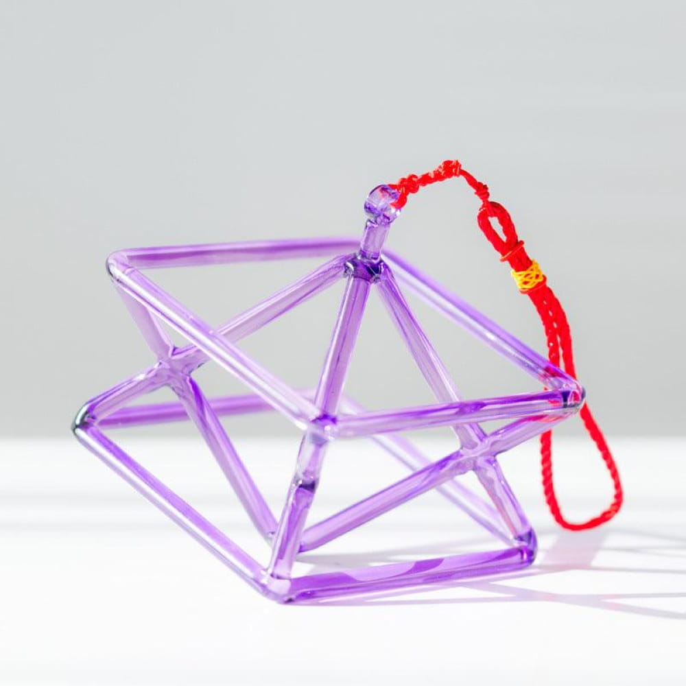 Purple geometric ornament with red string for Purple Quartz Merkaba Pyramid product