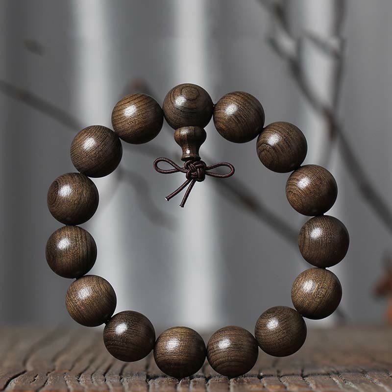 Seltenes spirituelles Armband aus Phoebe Zhennan-Holz, 15–25 mm Perlen