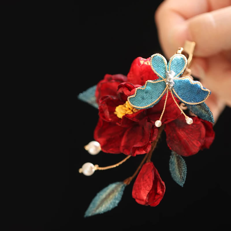 Chinesische Haarnadel mit rotem Kamelien-Schmetterling für Transformation und Hoffnung