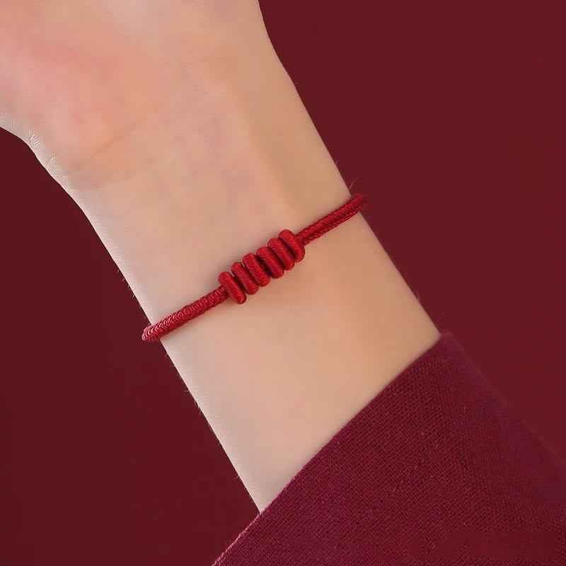 Rotes Armband mit achtsträngigem Seil