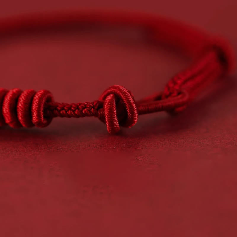 Rotes Armband mit achtsträngigem Seil