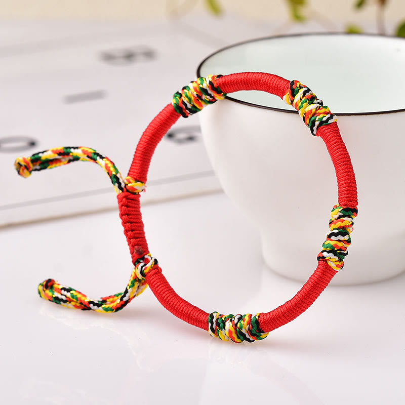 Rotes Schutzarmband mit tibetischem King Kong Knoten