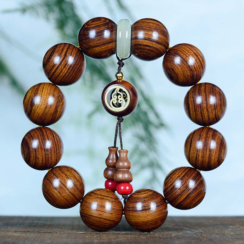 Spirituelles Armband mit Rosenholz-Kürbis-Charme für ruhigen Schutz