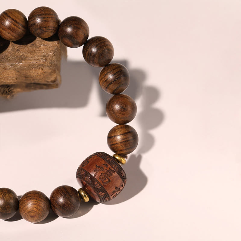 Spirituelles Armband aus Rosenholz mit Fu-Charakter | Wärme & Glück