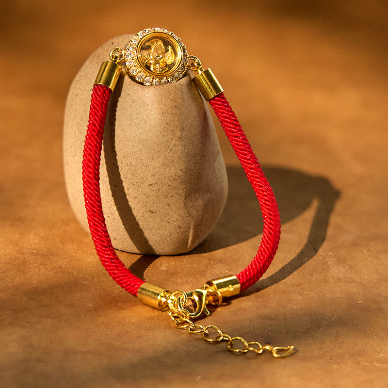 Drehbares Feng-Shui-Armband aus Kupfer mit roter Windmühlenschnur zum Schutz