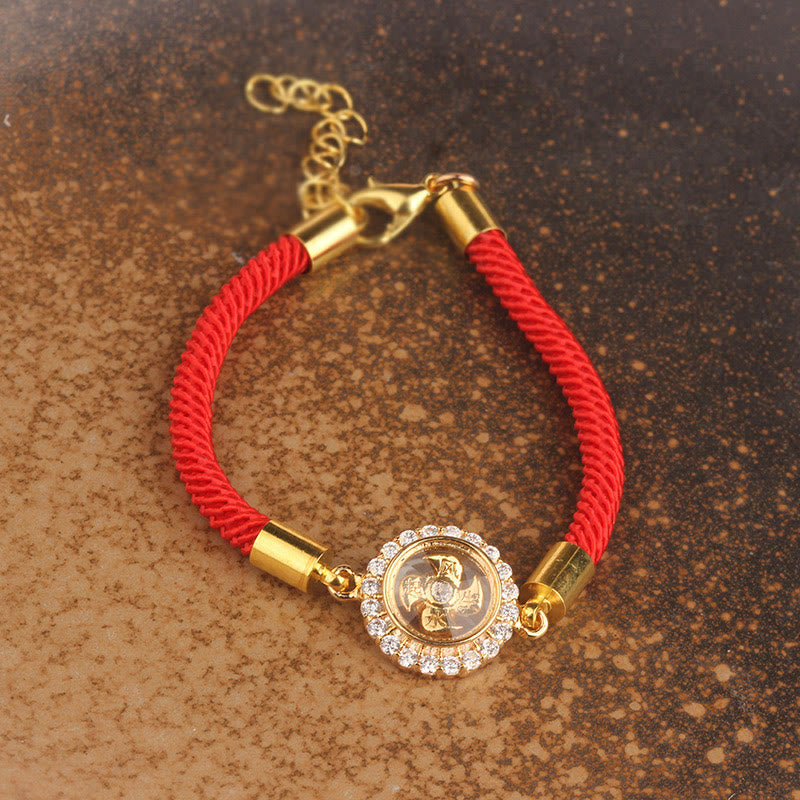 Drehbares Feng-Shui-Armband aus Kupfer mit roter Windmühlenschnur zum Schutz