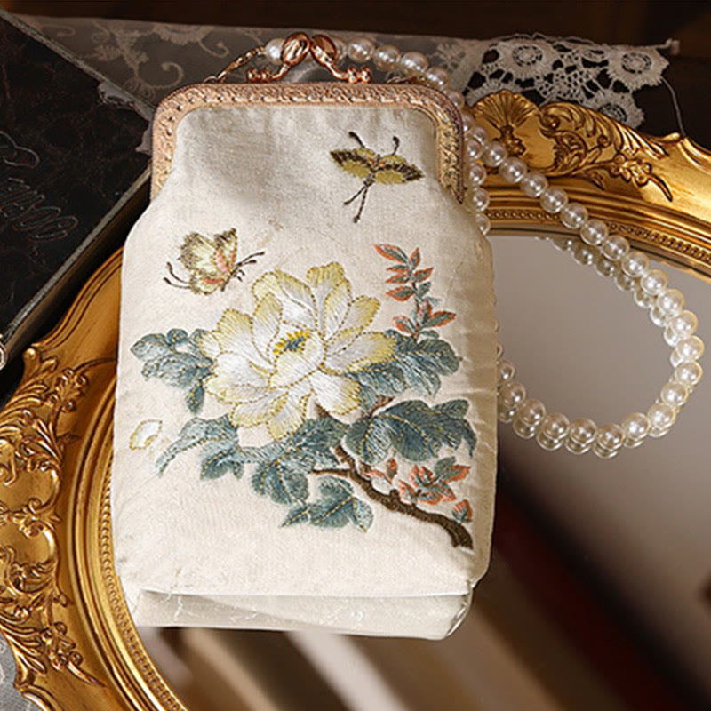 Kleine Umhängetasche mit Blumen- und Schmetterlingsstickerei und Perlenkette