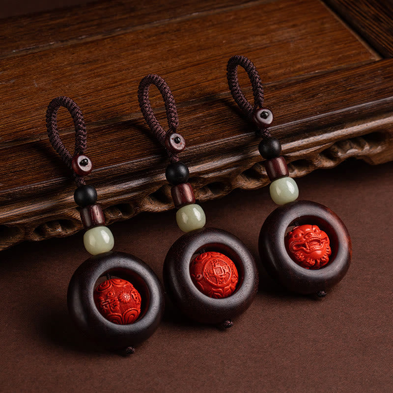 Schlüsselanhänger mit kleinem Blatt aus rotem Sandelholz „Om Mani Padme Hum“ zum Schutz