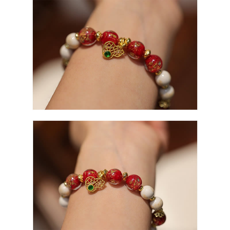 Spirituelles Kürbis-Armband „Gott des Reichtums“ mit Liuli-Glasperlen