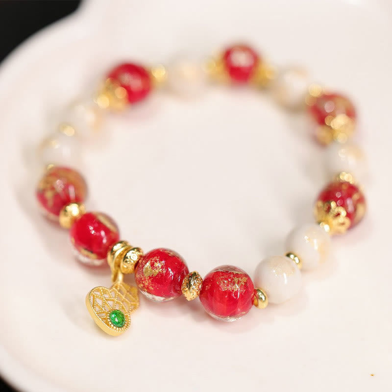 Spirituelles Kürbis-Armband „Gott des Reichtums“ mit Liuli-Glasperlen