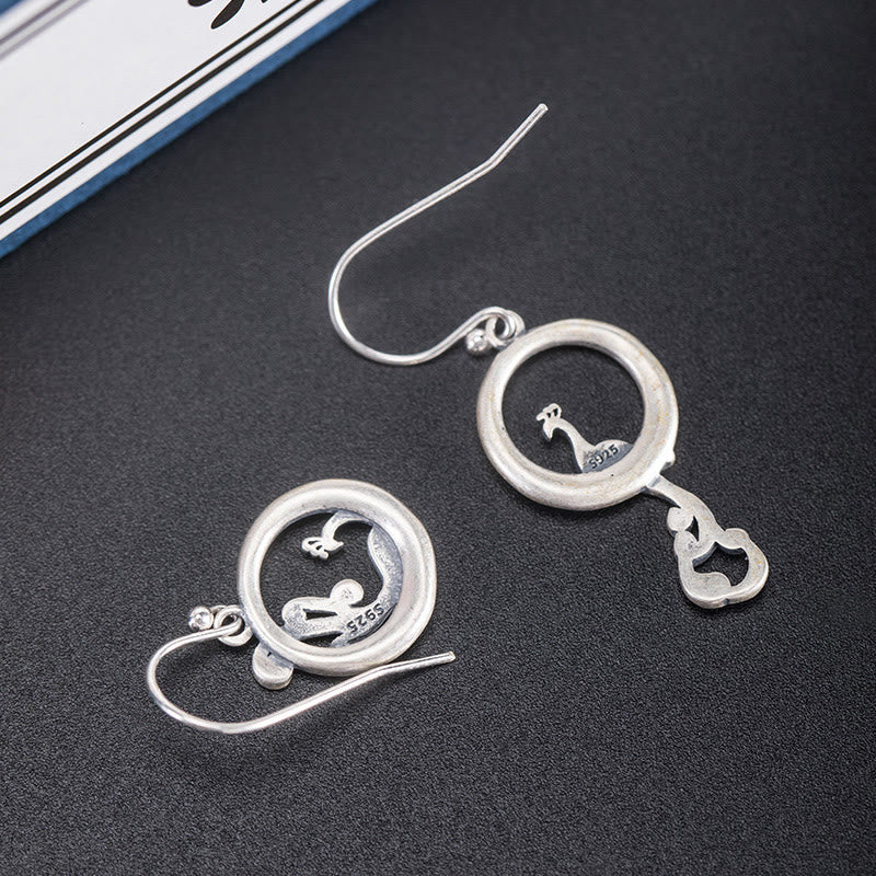 Spirituelle Ohrringe aus Sterlingsilber mit Pfauenmotiv