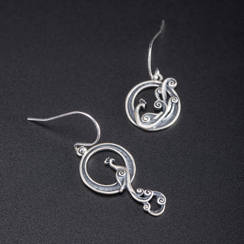 Spirituelle Ohrringe aus Sterlingsilber mit Pfauenmotiv