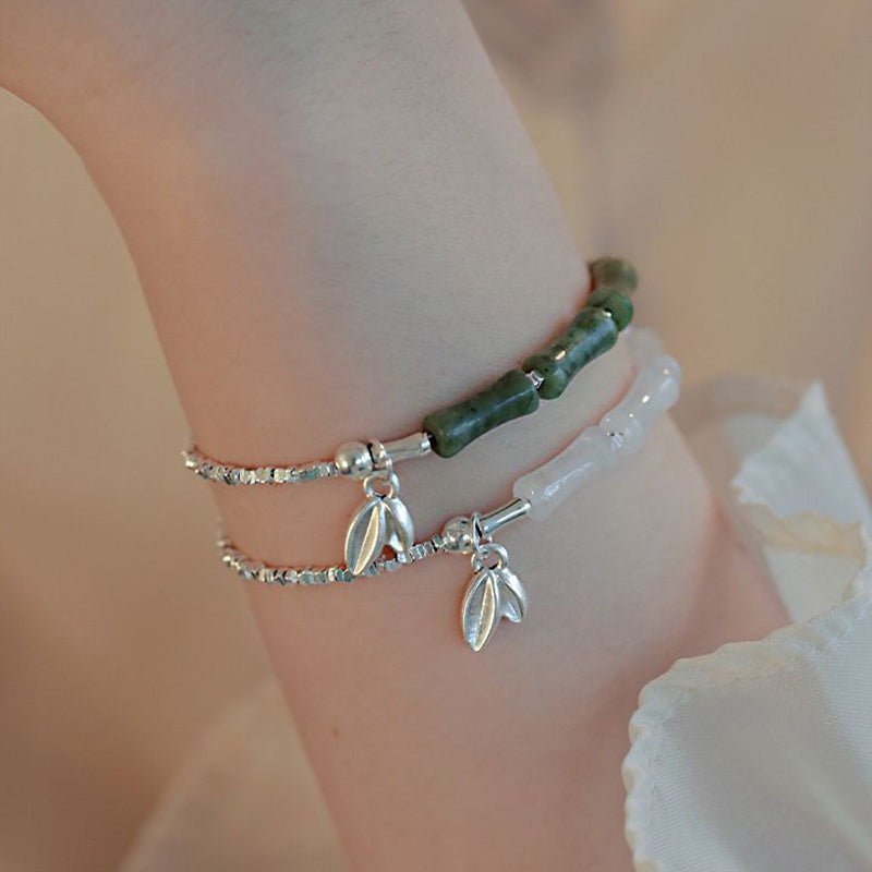 Spirituelles Armband aus Sterlingsilber mit Peridot und Bambus für Glück