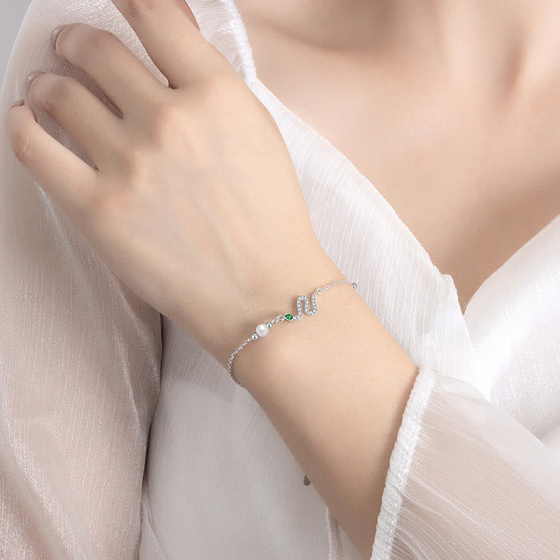 Glücksarmband aus Sterlingsilber mit Schlangenperlen