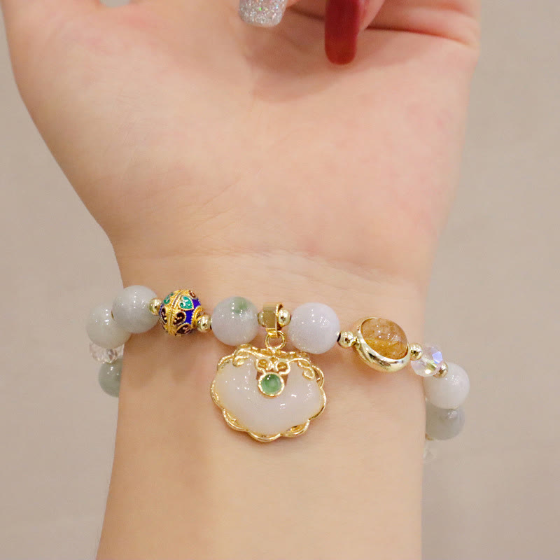 Heilarmband aus Erdbeerquarz mit chinesischem Schlossanhänger