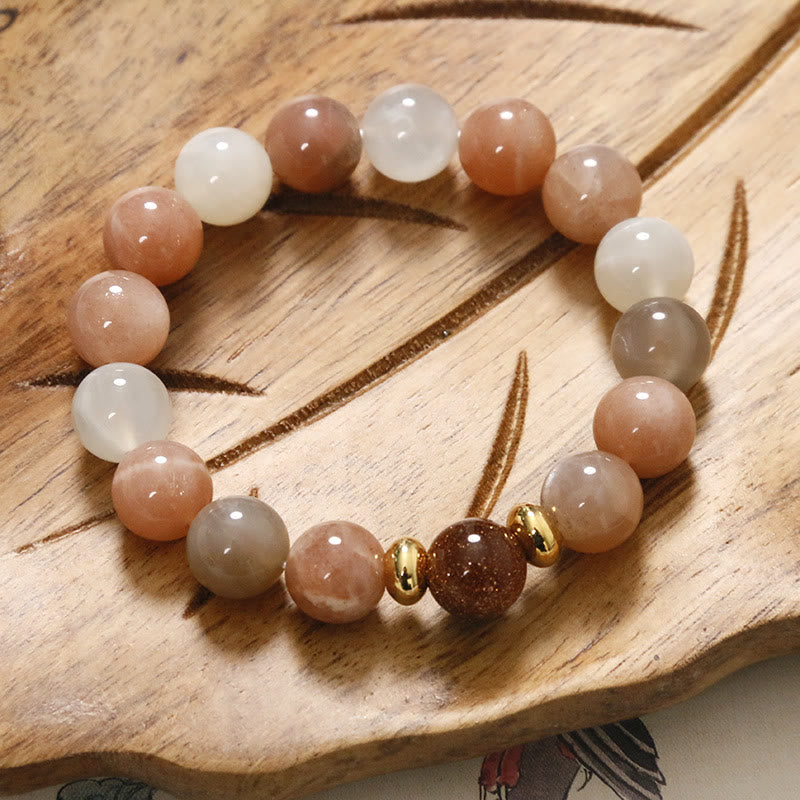 Spirituelles Armband aus Sonnenstein und Goldsandstein für Reichtum