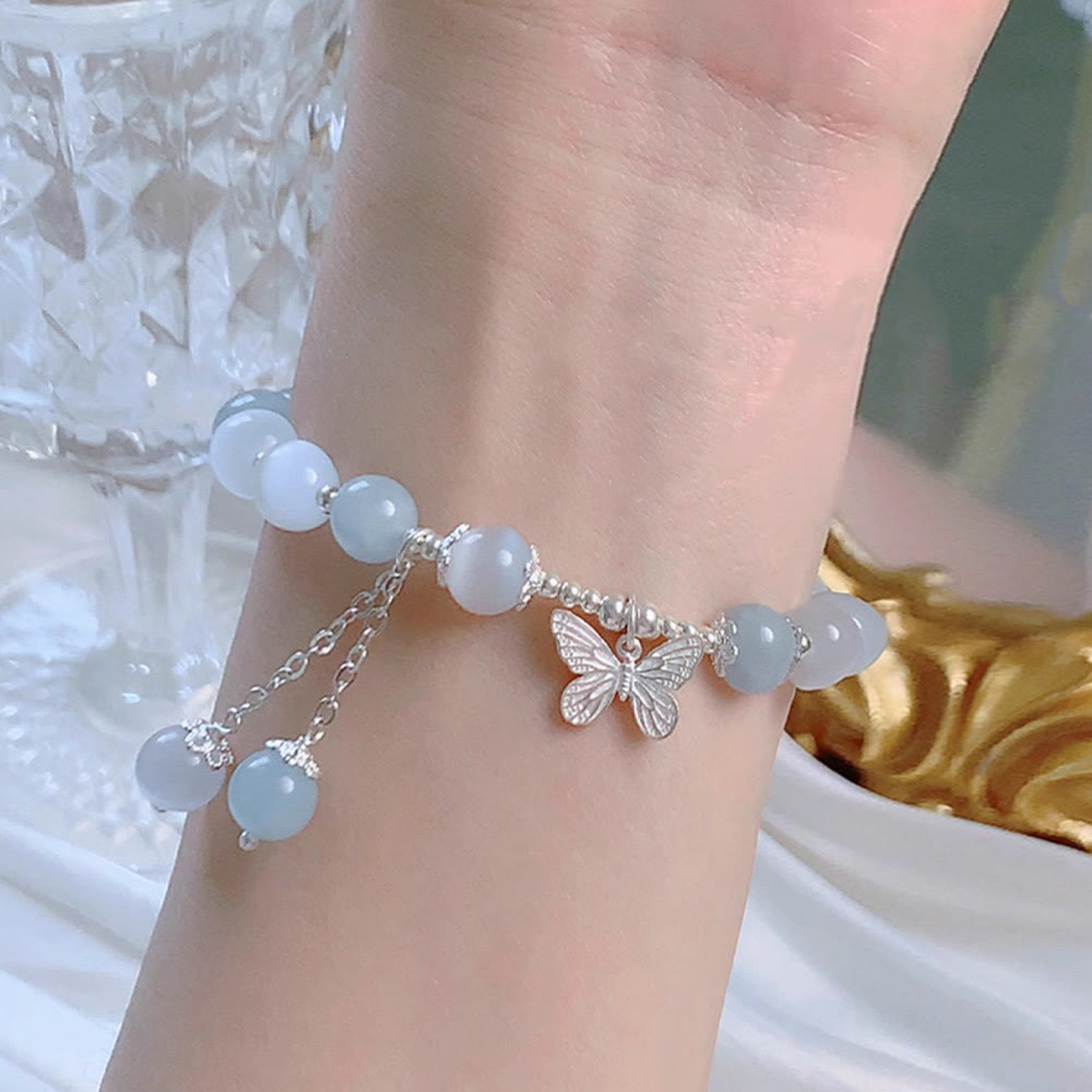 Unterstützen Sie das Aquamarin-Schmetterlings-Chakra-Armband mit heilenden Klängen