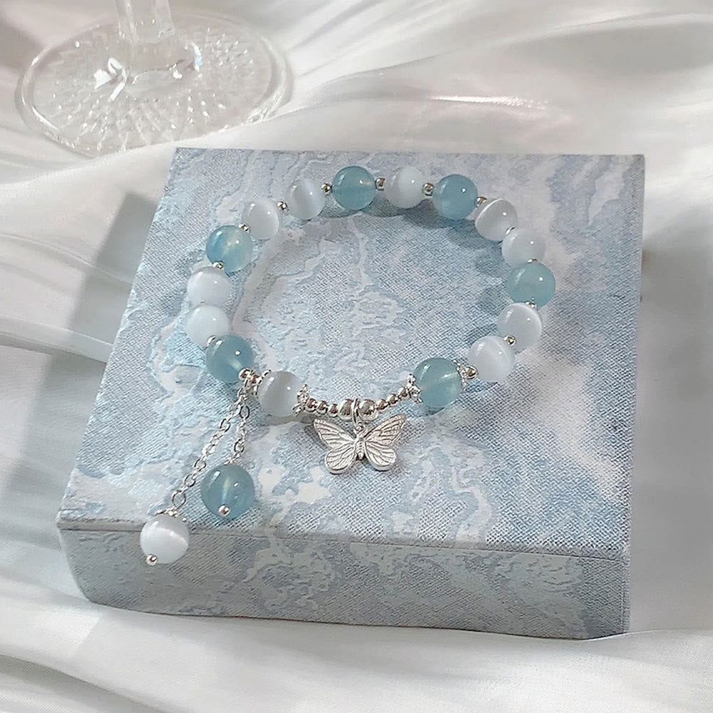 Unterstützen Sie das Aquamarin-Schmetterlings-Chakra-Armband mit heilenden Klängen