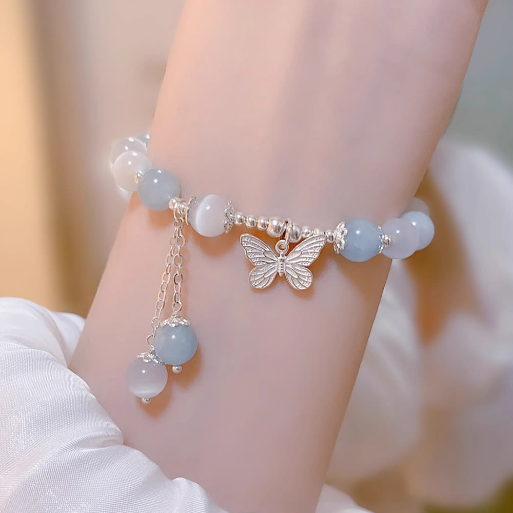 Unterstützen Sie das Aquamarin-Schmetterlings-Chakra-Armband mit heilenden Klängen