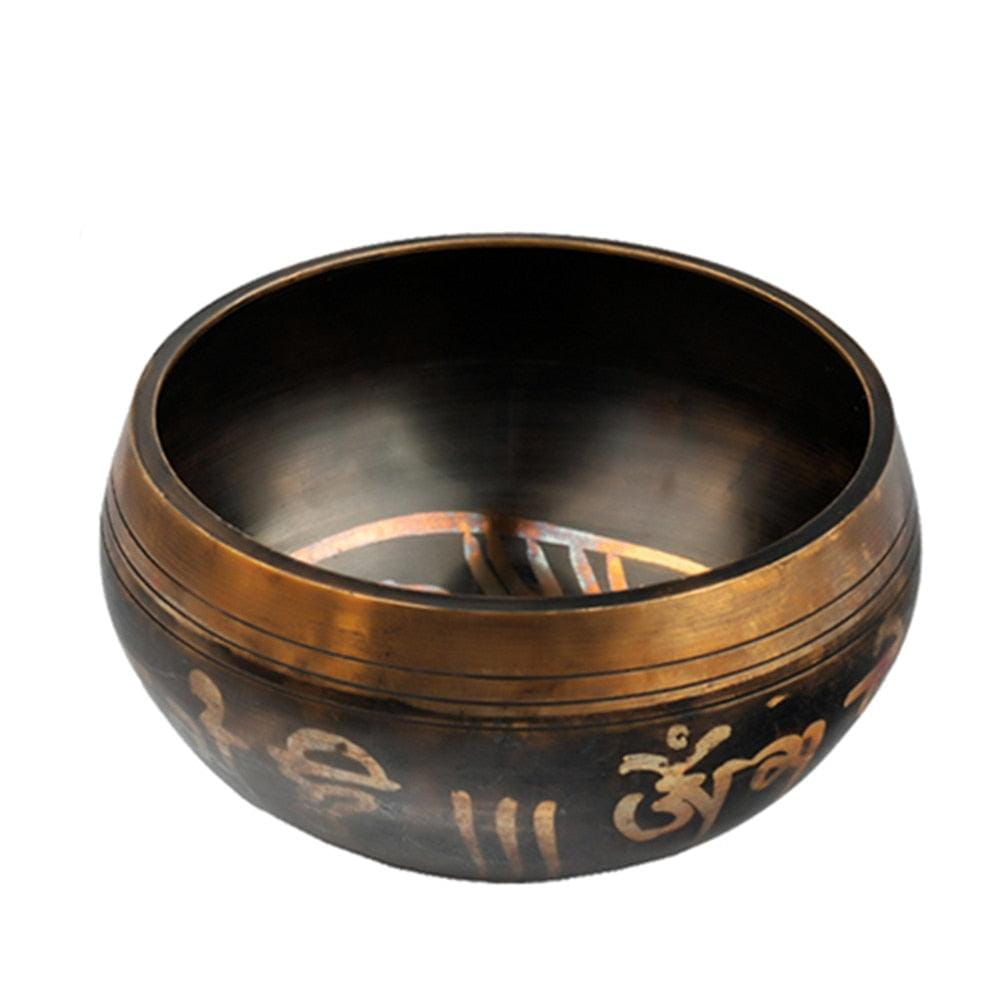 Tibetan Singing Bowl with Sanskrit inscriptions and copper-colored rim for meditation