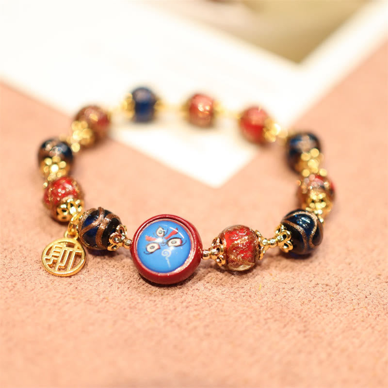 Tibetisches Gold-Schluckendes Tier-Glücksperlenarmband 10mm