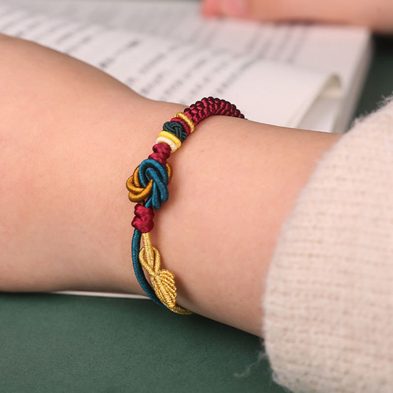 Tibetisches Mandala-Knoten-Glücksblatt-Armband mit roter Schnur