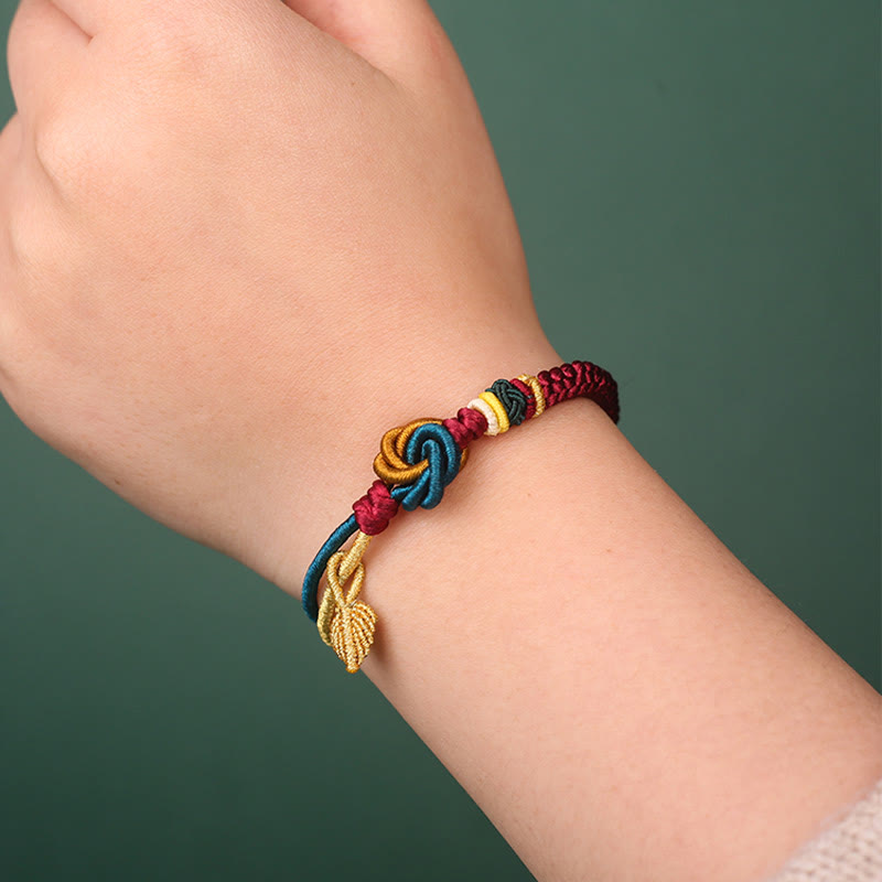 Tibetisches Mandala-Knoten-Glücksblatt-Armband mit roter Schnur