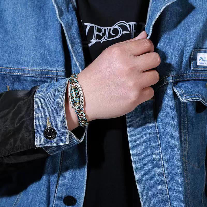 Tibetisches Neun-Augen-Dzi-Perlen-Schutzarmband mit Türkis, 18 cm