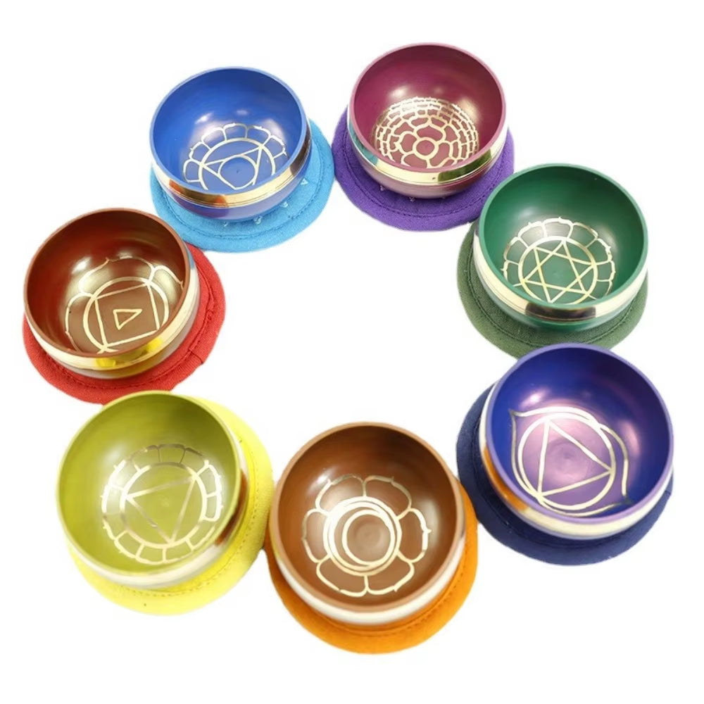 Colorful Chakra Meditation Bowls with Etched Spiritual Symbols for Healing and Relaxation