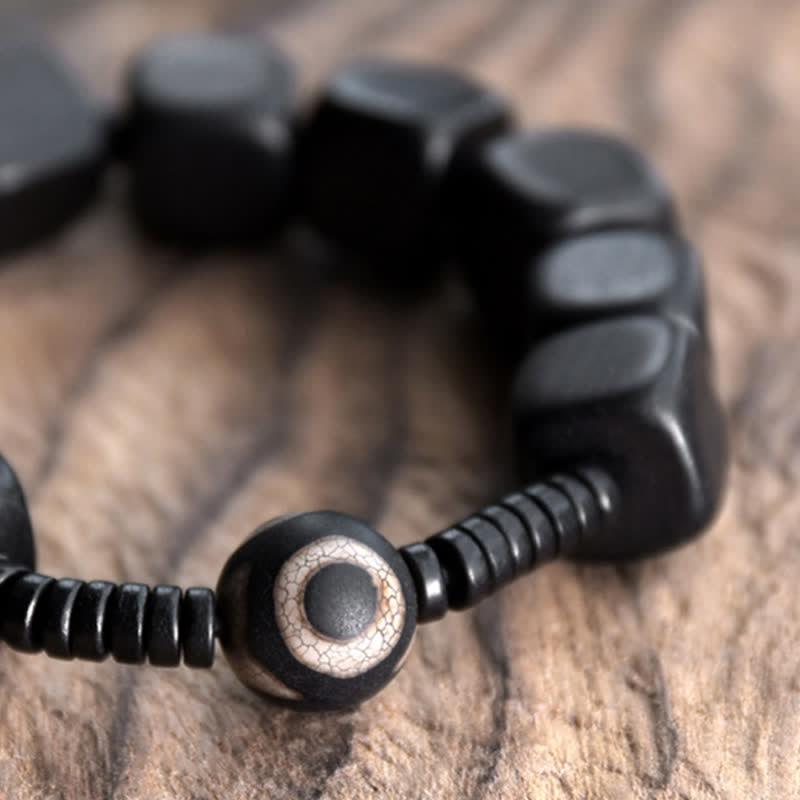Unisex Ebenholz Dzi Perle spirituelles Armband für Stärke