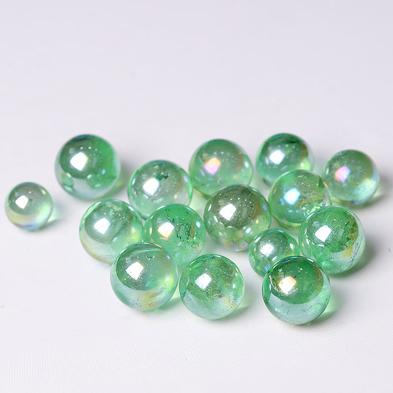 Clear iridescent green glass marbles from 0.25kg Aura Green Crystal Sphere healing orb