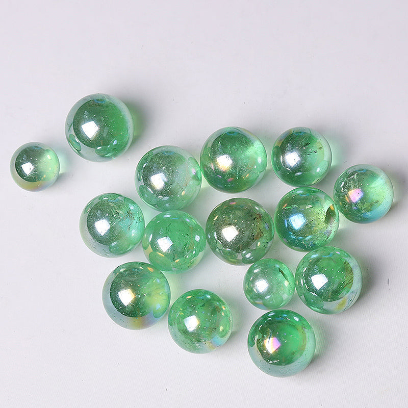 Iridescent green glass marbles from the 0.25kg Aura Green Crystal Sphere Healing Orb