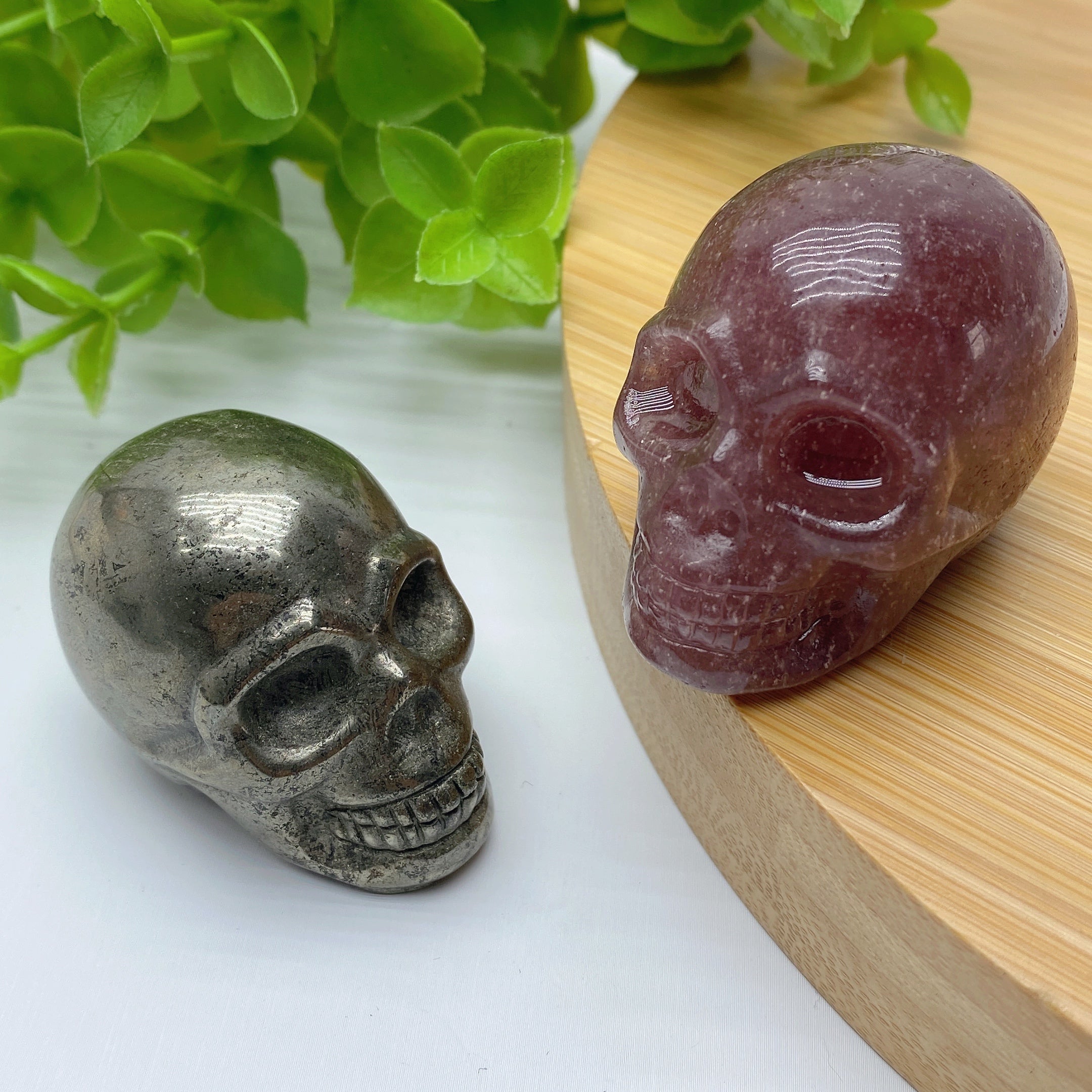 1.85 inch Pyrite & Strawberry Quartz Crystal Skull Carvings
