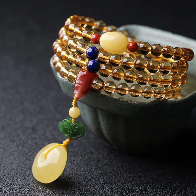 Mala-Armband mit 108 Perlen aus Citrin und Bernstein für den Frieden