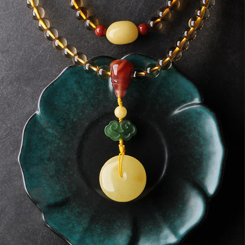 Mala-Armband mit 108 Perlen aus Citrin und Bernstein für den Frieden