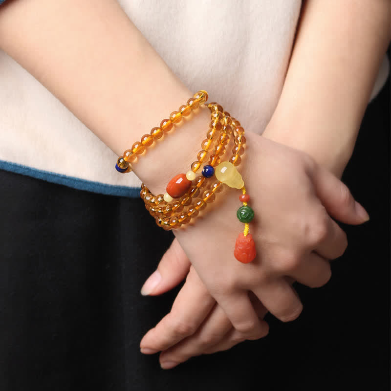 Mala-Armband mit 108 Perlen aus Citrin und Bernstein für den Frieden