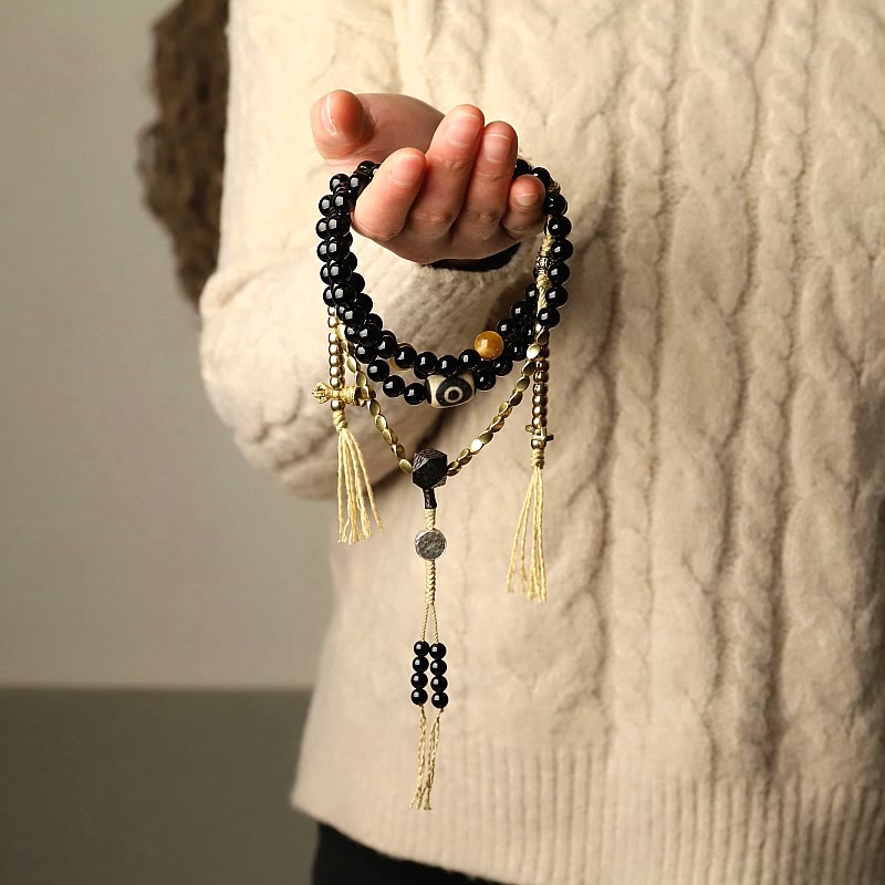 Mala-Armband mit 108 Perlen aus schwarzem Onyx und Schutzedelstein