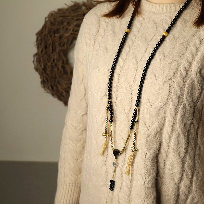 Mala-Armband mit 108 Perlen aus schwarzem Onyx und Schutzedelstein